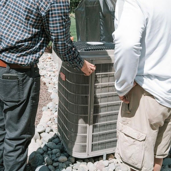 air-conditioning-installation-1_600x600 Black Lion Heating, Air Conditioning, & Electrical technician installing a Bryant air conditioner.