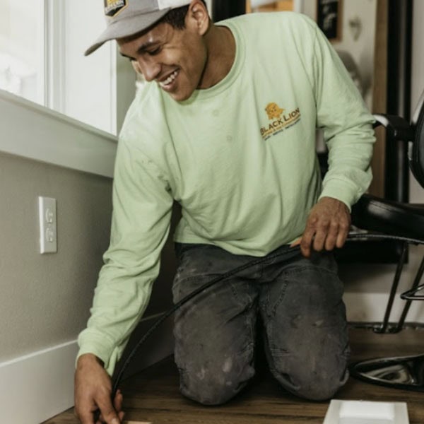 air-ducts-1_600x600 Black Lion Heating, Air Conditioning, & Electrical technician fixing an air duct.